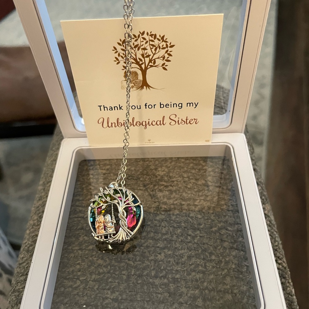 Beautiful Unbiological Sister Necklace. Stunning , background color’s amazing